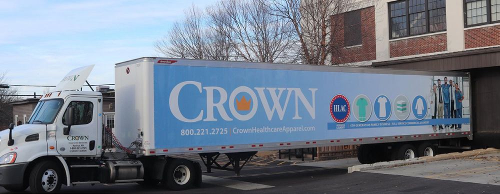 Crown Uniform & Linen branded box truck